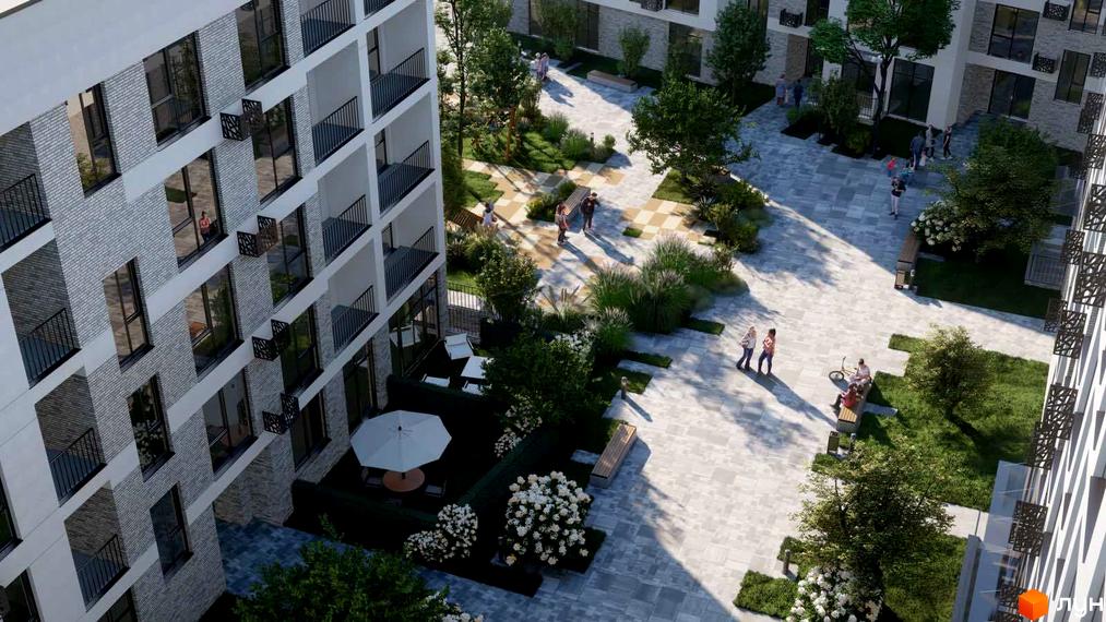 Вид на житловий комплекс San Marco з висоти пташиного польоту. Білі будівлі з балконами та доглянута прибудинкова територія з зеленими насадженнями та місцями для відпочинку.