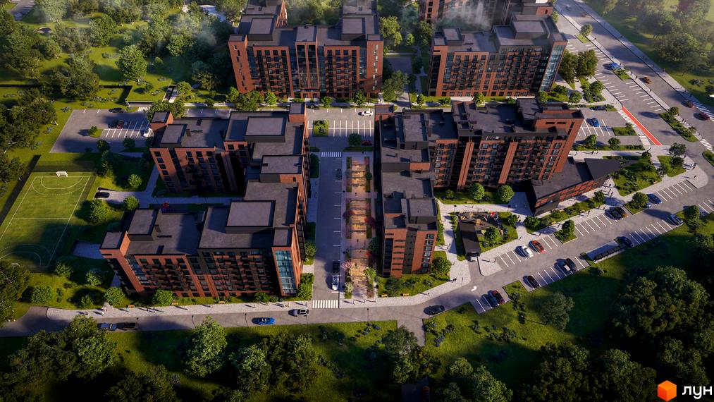 Житловий комплекс Royal Town з цегляними фасадами та упорядкованою прибудинковою територією з місцями для відпочинку та спортивними майданчиками.