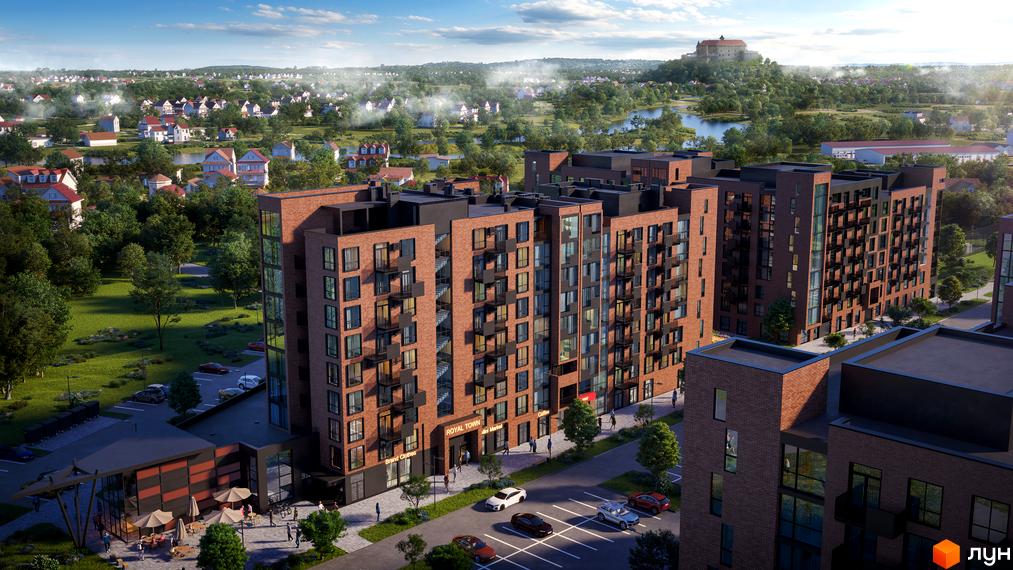 Житловий комплекс Royal Town з цегляним фасадом та балконами, оточений зеленою зоною та іншими будинками.
