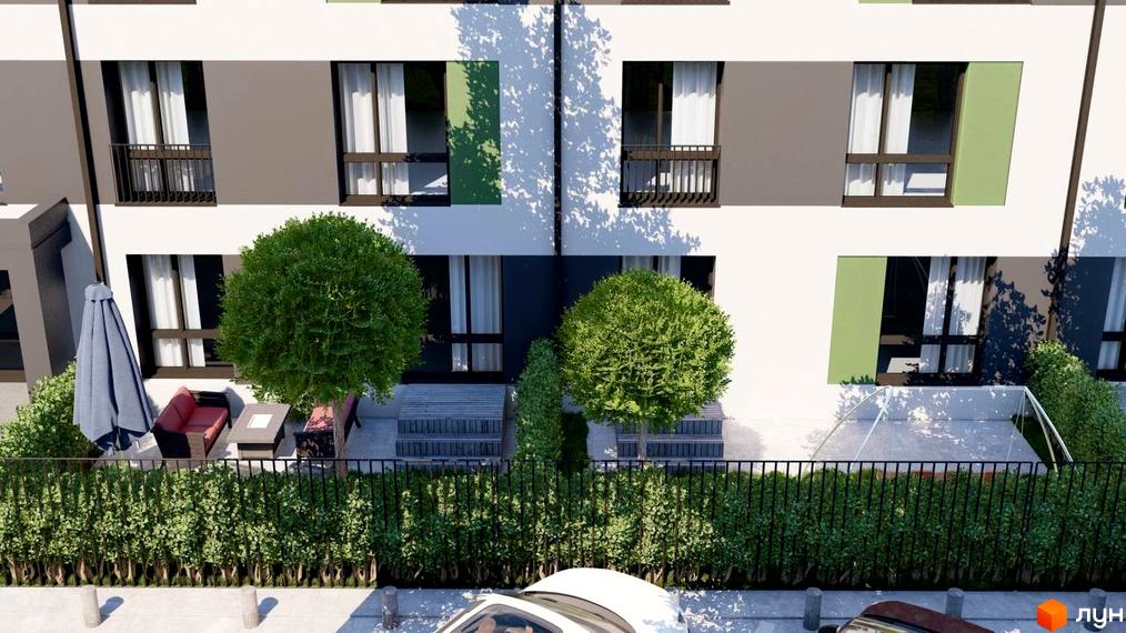 Зображення сторінки ЖК Клубний будинок „ЛАГОМ +“. На фото фасад будинку з великими вікнами та балкончиками, перед будинком зелені насадження та зона відпочинку.