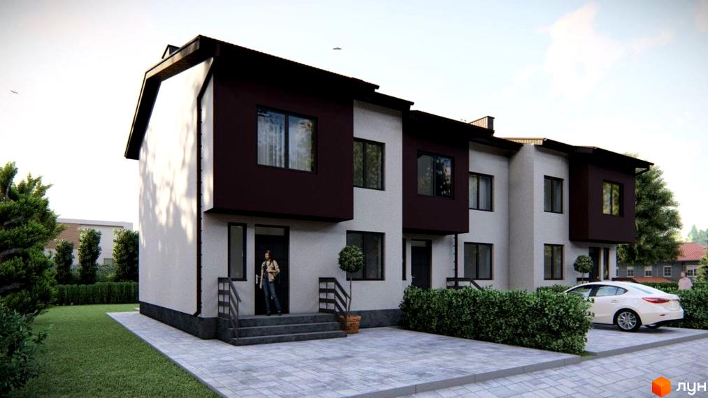 Триповерховий будинок з темно-коричневими вставками на фасаді. Перед будинком вимощена бруківкою площа, ростуть кущі та невеликі дерева.