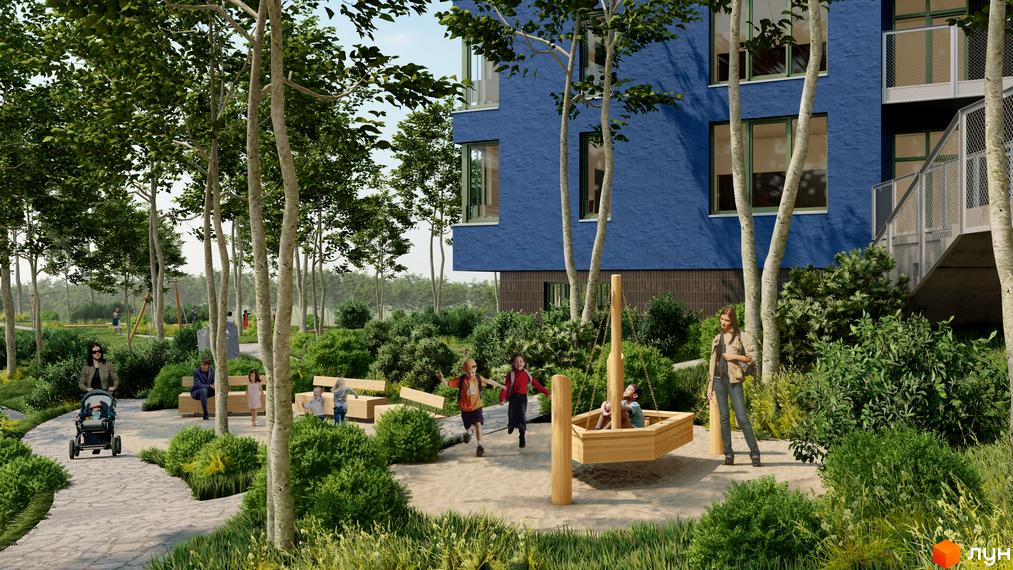 Житловий комплекс ПІД ЗОРЯМИ. Зелена прибудинкова територія з дитячим майданчиком та місцями для відпочинку біля синьої будівлі.