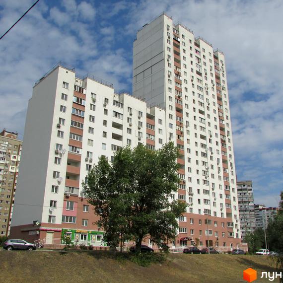 Житловий комплекс на проспекті Червоної Калини, 1-3, з сучасною архітектурою та прибудинковою територією.