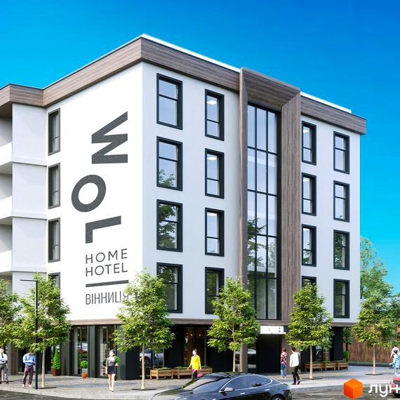 Апарт-готель WOL Vinnytsia. Багатоповерховий будинок з великими вікнами та вхідною групою. Перед будинком висаджені дерева та облаштована прибудинкова територія.