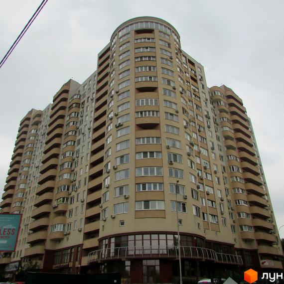 Житловий комплекс Ново-Деміївський з сучасною архітектурою та прибудинковою територією, облаштованою для комфортного проживання.