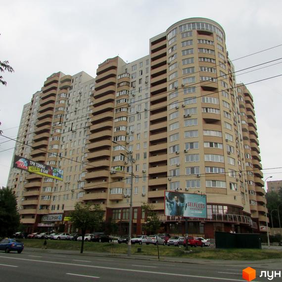 Житловий комплекс Ново-Деміївський з сучасною архітектурою та прибудинковою територією, облаштованою для відпочинку.