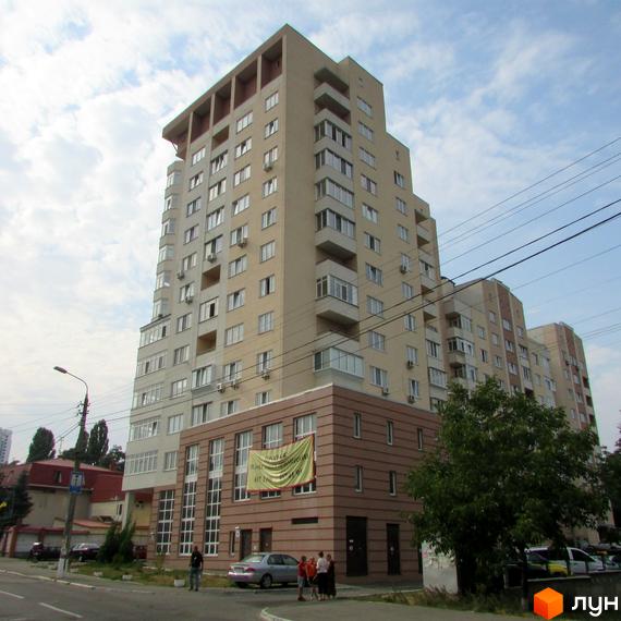 Житловий комплекс на вул. Петропавлівська, 50, 50б, висотна будівля з балконами та прибудинковою територією.