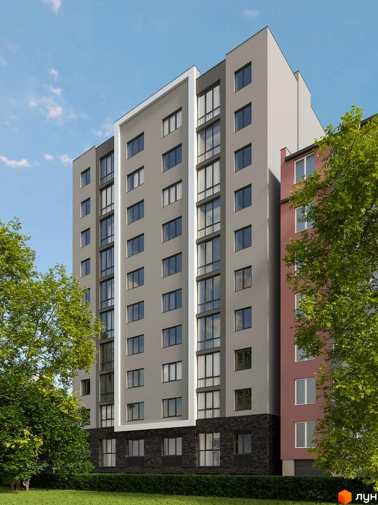 Зовнішній вигляд новобудови ЖК Комфорт Сіті з сірими фасадами та великими вікнами, поруч зелені дерева та газон.