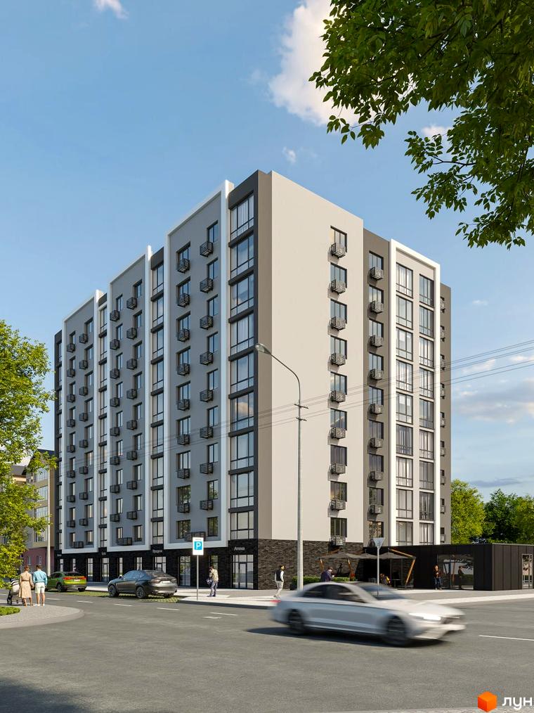 Зовнішній вигляд багатоповерхового житлового комплексу Комфорт Сіті з сірими фасадами та темними вікнами. На прибудинковій території видно дорогу з автомобілями та пішохідну зону з людьми.