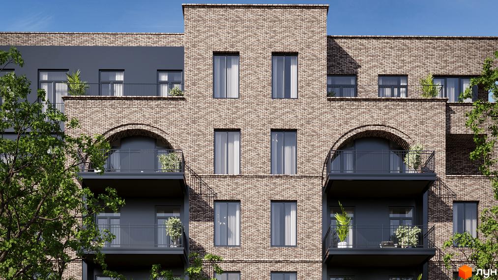 Клубний будинок LOFT EGOIST має цегляний фасад з темними балконами, арковими та прямокутними вікнами. Навколо видно зелені дерева.