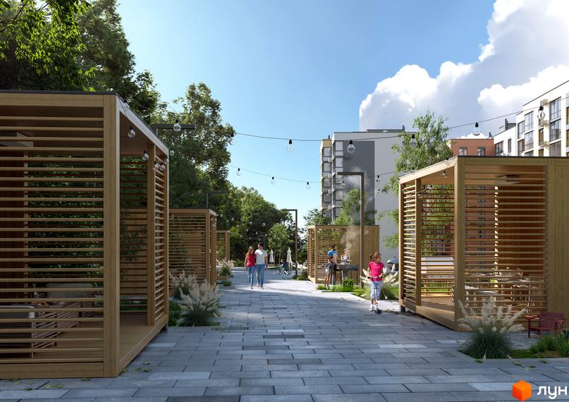 Багатоповерхові будинки Житлового комплексу HARMONY for life з сірими та білими фасадами. На прибудинковій території облаштована пішохідна зона з дерев'яними альтанками та освітленням.