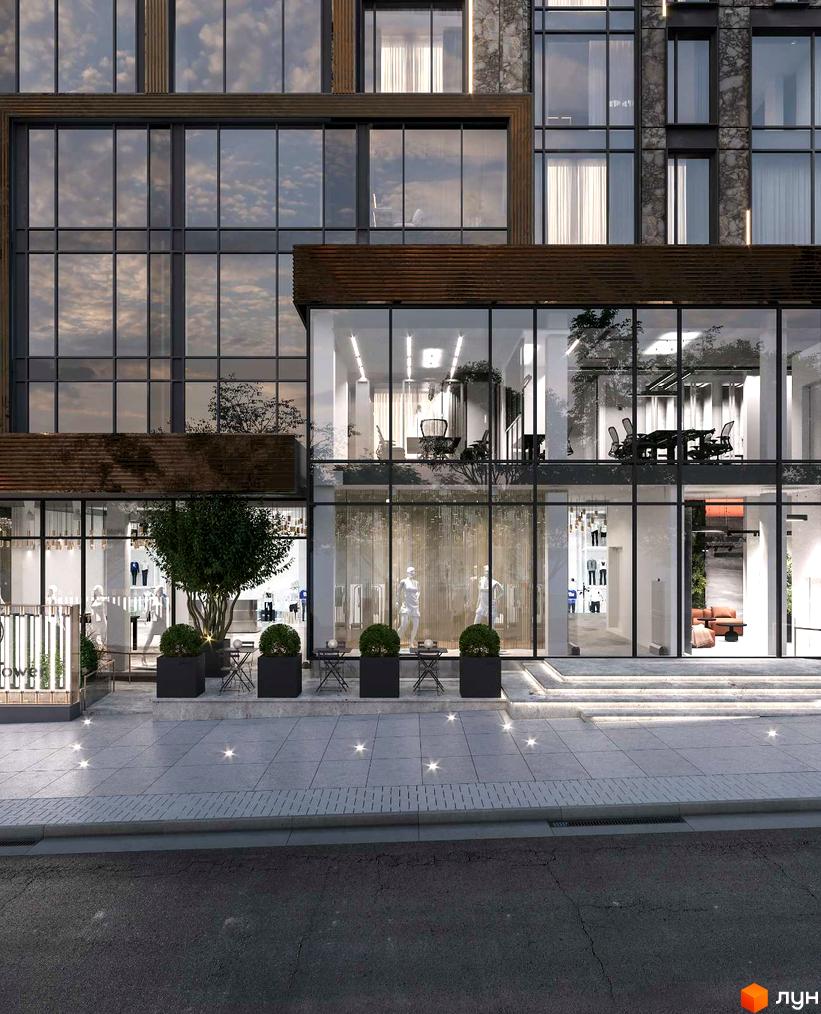 Фасад будівлі ЖК Park Tower з панорамним склінням. Перед будівлею розташовані столики, дерева та ліхтарі, що підкреслюють архітектурний дизайн.