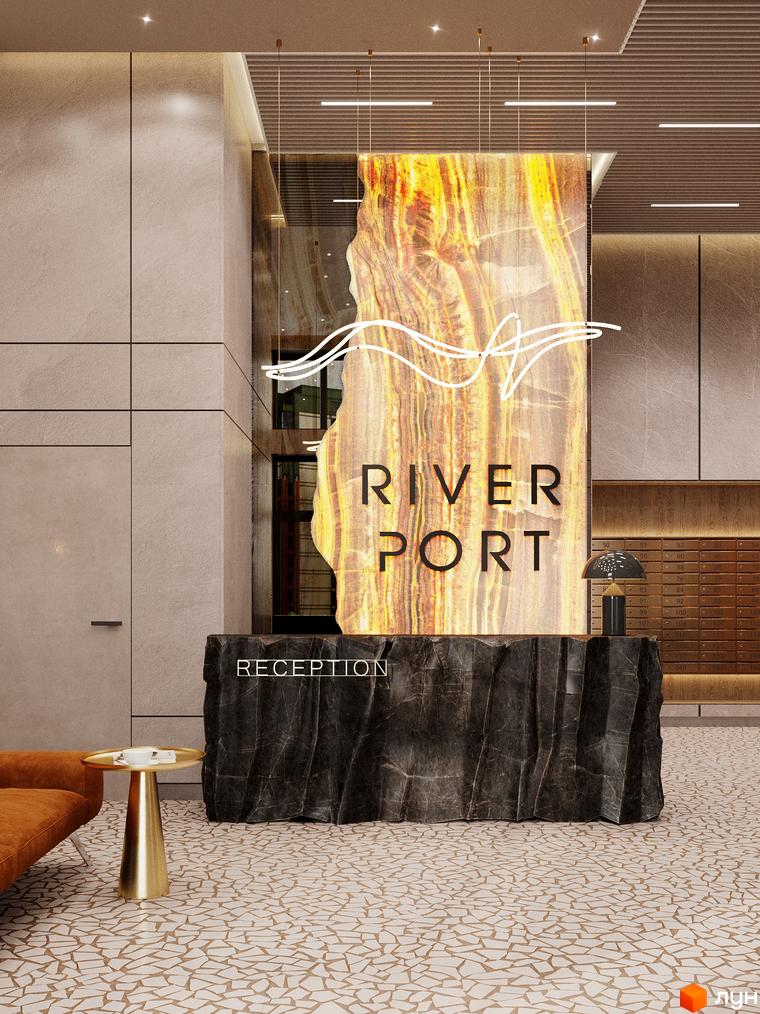 Холл ЖК River Port з рецепцією, оздоблений каменем та підсвіткою. Навколо - оздоблення стін та підлоги, що створює атмосферу розкоші.