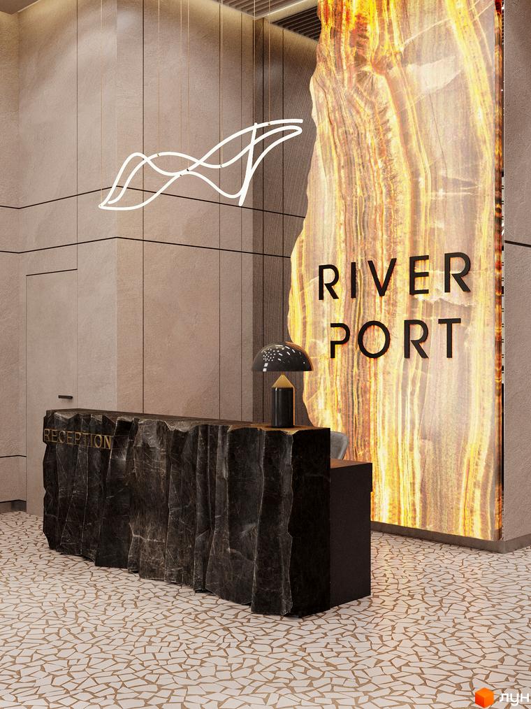 Ресепшен в ЖК River Port з кам'яною стійкою та написом 