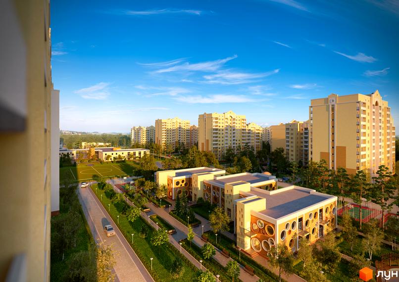 Житловий комплекс Софія Київська. Високі будинки з жовтими фасадами. На території комплексу є зелені зони, дитячі майданчики та спортивні зони.