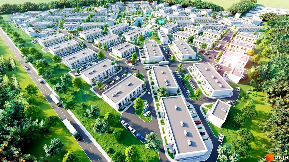 Аерофотографія Таунхаусів DREAM HOUSE: білі двоповерхові будинки з пласкими дахами, оточені зеленими насадженнями, дорогами та парковками.