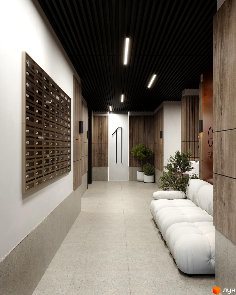 Сучасний хол житлового комплексу ЖК GLOBUS BALANCE з поштовими скриньками та диваном. Оздоблення стін деревом та світлою плиткою на підлозі.