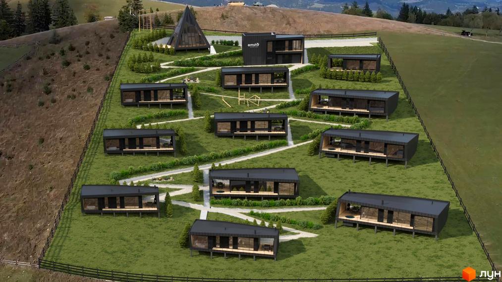 Зображення Котеджного містечка Emshir Villas з будинками на зеленій ділянці. Навколо будинків розташовані доріжки та дерева.