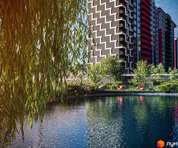 Житловий комплекс SKYGARDEN з багатою зеленою прибудинковою територією та водоймою. Сучасна архітектура будівель з яскравими акцентами.