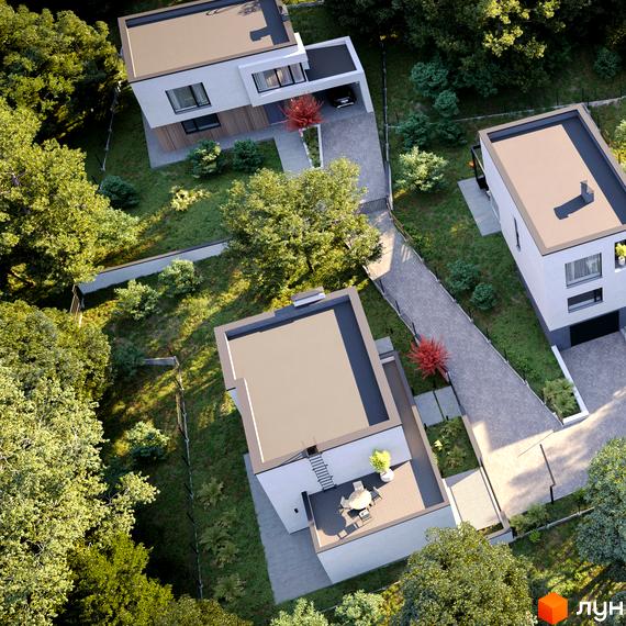 Вигляд зверху на Котеджне містечко Hillside з будинками з плоскими дахами. Навколо будинків зелені дерева та доглянута територія.