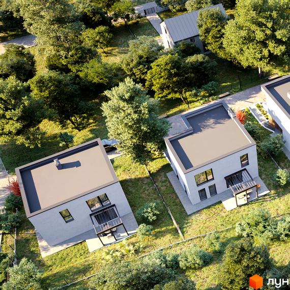 Вигляд зверху на будинки Котеджного містечка Hillside з плоским дахом і великими вікнами. Навколо будинків зелені насадження та доглянутий газон.