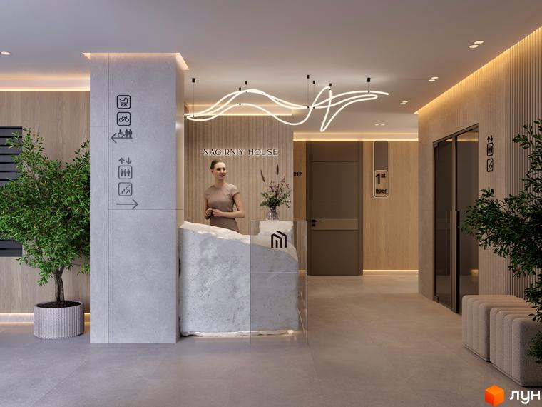 Просторий вестибюль новобудови NAGIRNIY HOUSE з рецепцією, інформаційними вказівниками та озелененням.