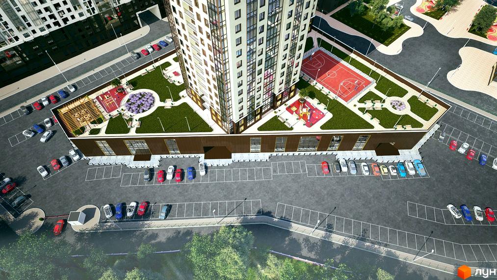 Висотна будівля житлового комплексу з великою прибудинковою територією. На території є дитячий майданчик, баскетбольний майданчик та місця для відпочинку.