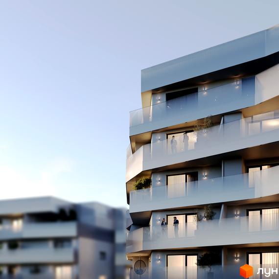 Новобудова Holosko Residents з виступаючими балконами та скляними огорожами на фоні блакитного неба. Навколо видно інші будинки комплексу.