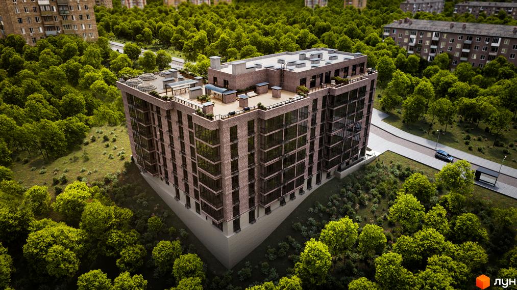 Клубний будинок Protasiv Hill з цегляним фасадом та великими вікнами, оточений зеленню та дорогою з автомобілем.