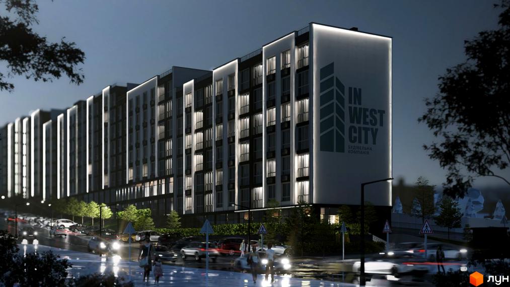 Зовнішній вигляд будинку житлового комплексу WEST CITY ввечері. Навколо будівлі припарковані автомобілі.