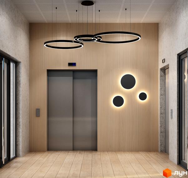 Інтер'єр холу з ліфтами у Житловому комплексі Вертикаль. Вигляд на підлогу, стіни та освітлення в зоні очікування.