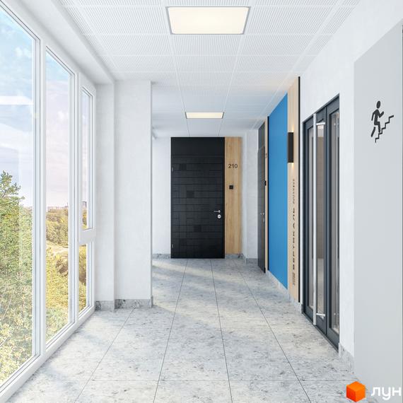 Просторий коридор Житлового комплексу Вертикаль з великими вікнами, що відкривають вид на лісопаркову зону та міські забудови.