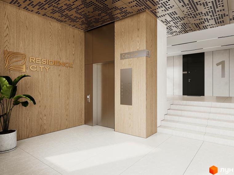 Інтер'єр холу в Житловому комплексі Residence City з ліфтом та вказівником секції. Вигляд на вхідну зону з номерним позначенням квартири.