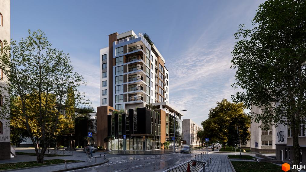 Житловий комплекс Полетаєва: багатоповерховий будинок з балконами та скляними фасадами, розташований біля дороги з деревами та тротуаром.