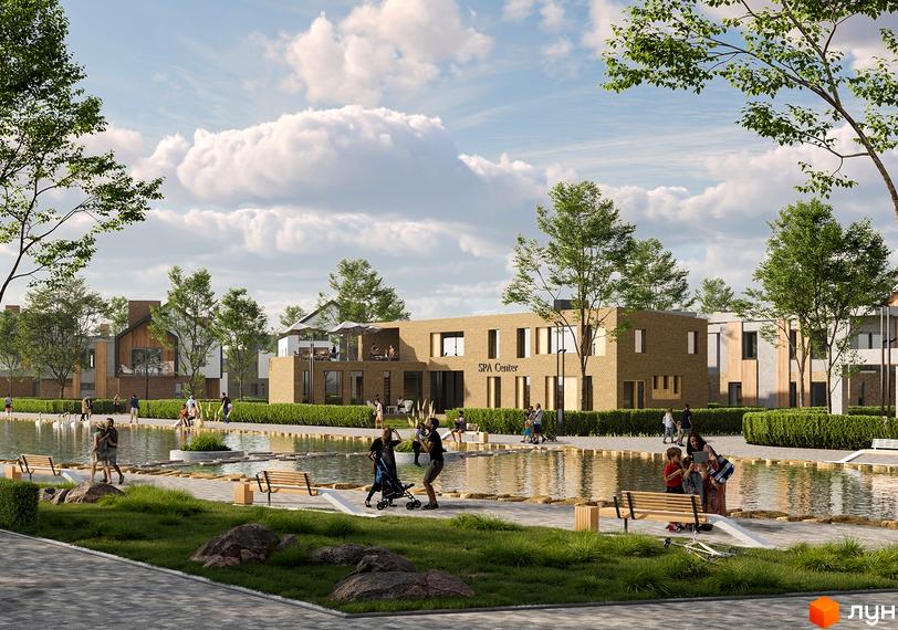 Котеджне містечко Gross Liebental: світлі будівлі з цегляними та дерев'яними фасадами. Прибудинкова територія має водойму, прогулянкові зони та зелені насадження.