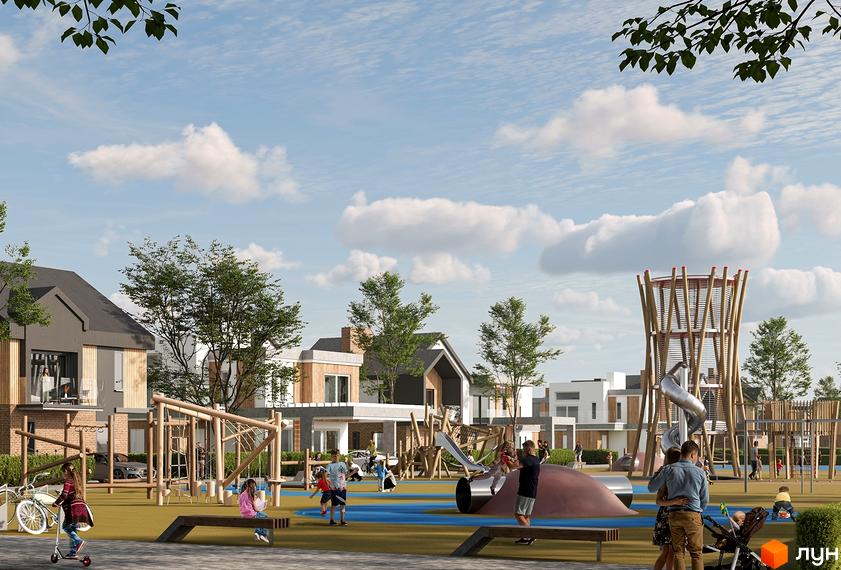 Котеджне містечко Gross Liebental: будинки з темними дахами та світлими фасадами. Просторий дитячий майданчик з дерев'яними ігровими комплексами.