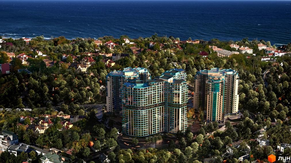 Житловий комплекс Aqua Marine розташований біля моря. Багатоповерхові будинки з панорамними вікнами, навколо зелені насадження.