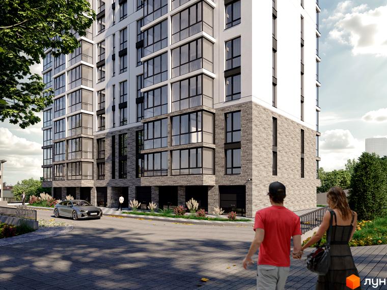 Житловий комплекс Перемога: фасади будівель з панорамними вікнами та цегляним оздобленням, прибудинкова територія з дорогою та пішохідною зоною.