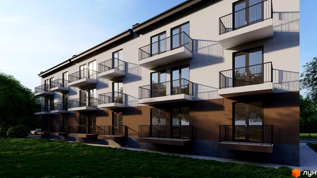 Зовнішній вигляд багатоквартирного будинку з балконами на вулиці Наливайка. Навколо будинку зелена галявина та дерева.