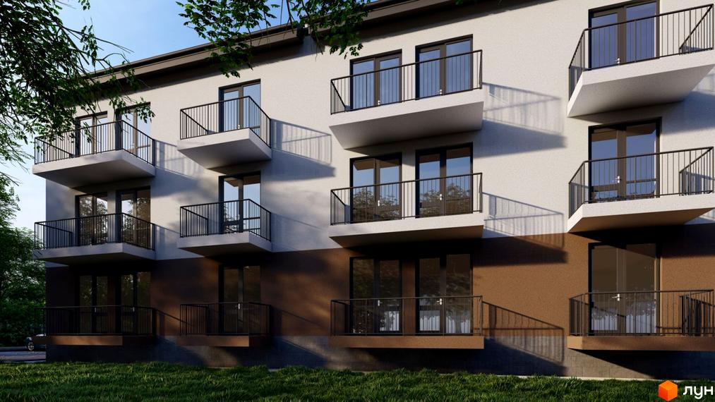 Фасад житлового комплексу на вул. Наливайка з балконами та вікнами, оточений зеленню та травою.