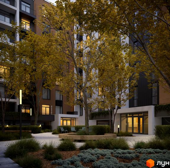 Житловий комплекс Avalon Holiday One з осінніми деревами та затишним внутрішнім двориком. На території розташовані лавки, ліхтарі та зелені насадження.
