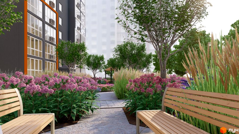 Житловий комплекс НЕЗАЛЕЖНІСТЬ: фасад будівлі з панорамними вікнами та прибудинкова територія з квітами та лавками.