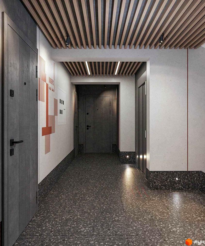 Вхідна група Житлового комплексу НЕЗАЛЕЖНІСТЬ: коридор з дерев'яними ламелями на стелі, світлими стінами та темною підлогою. Видно двері квартир.