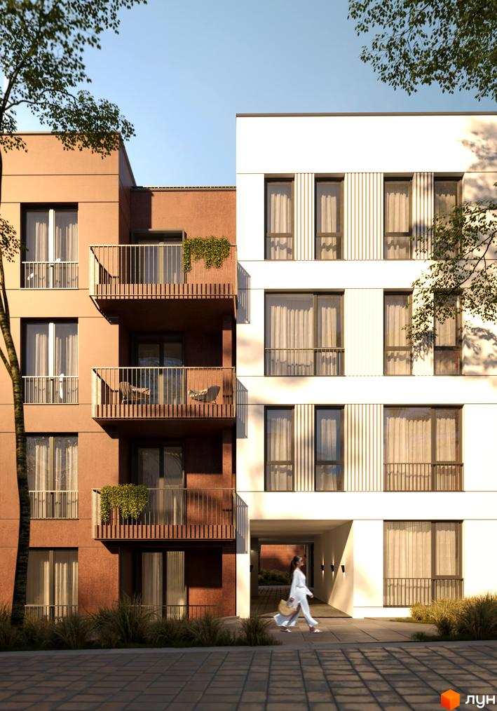 Фасад будівлі житлового комплексу SUMMERSTONE VILLAGE з балконами та вікнами, поруч дерева та тротуар.