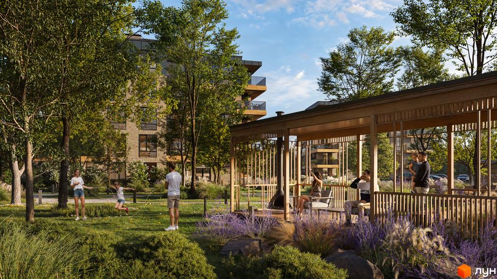 Житловий комплекс Park House: цегляні будинки з балконами та зелена прибудинкова територія з дитячим майданчиком та альтанкою.