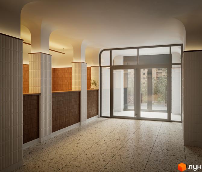 Інтер'єр вхідної групи житлового комплексу Kub29 з великими вікнами та світлою підлогою. Видно колони та оздоблення стін плиткою.