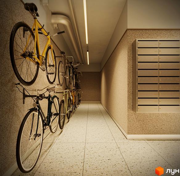 Сучасний велопаркінг у житловому комплексі Kub29 з індивідуальними ячейками для зберігання велосипедів. Зручне та безпечне місце для вашого двоколісного транспорту.