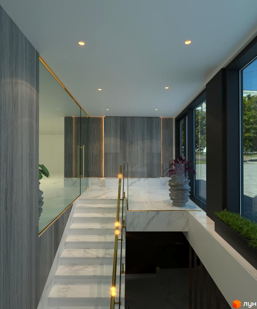 Сучасний дизайн холу Linden Luxury Residences з мармуровими сходами та скляними перилами. Великі вікна відкривають вид на зелену територію.