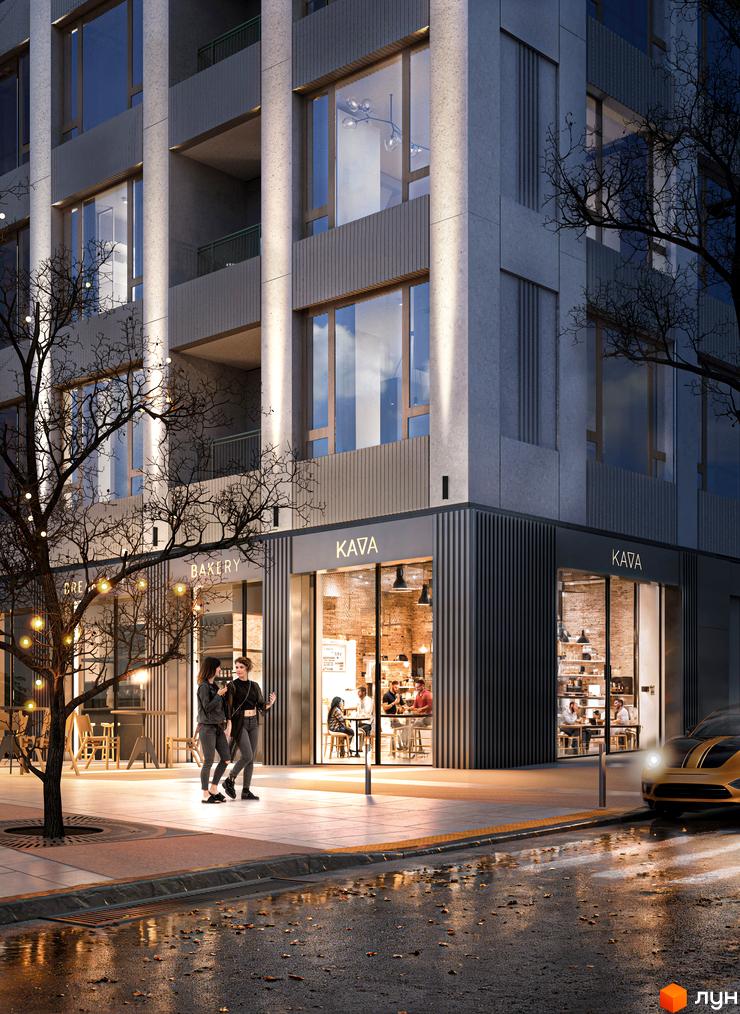 Фасад будівлі ЖК Lypynsky з великими вікнами та вхідною групою з кафе. На тротуарі біля будинку стоять люди, поруч припаркований автомобіль.