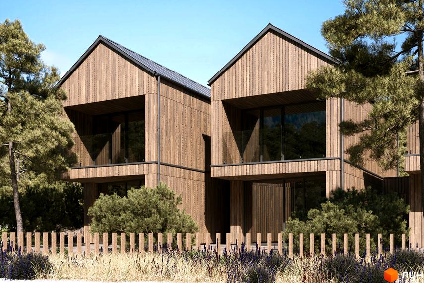 Два дерев'яних будинки з великими вікнами та балконами, оточені деревами та огороджені дерев'яним парканом. Комплекс КМ Migovo Ski & SPA.